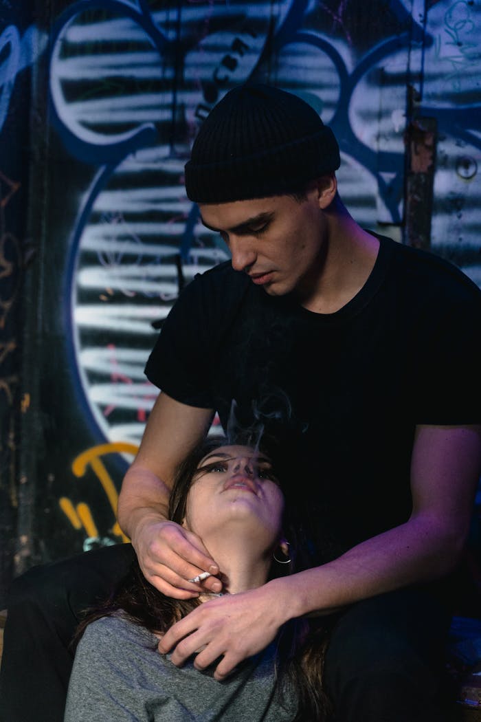 Mastering the First Impression: Your intriguing post title goes here Couple in an urban setting with graffiti art, evoking edgy and artistic vibes.